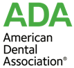 The image displays a logo with the letters  ADA  prominently featured at the top, followed by the text  AMERICAN DENTAL ASSOCIATION  underneath. The logo is set against a white background and includes a green checkmark-like symbol to the left of the word  ADA.